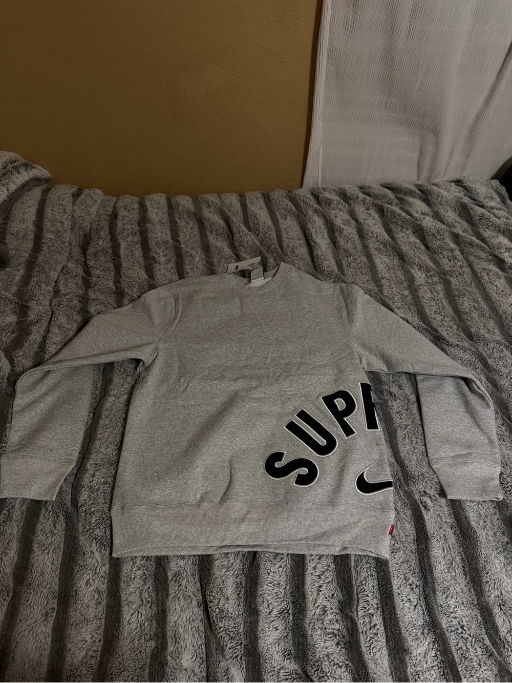 Supreme Gray Crewneck Sweatshirt with Bold Black Logo